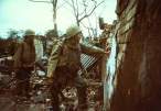 Marines leaning against the wall of the citadel, 1968.jpg