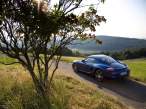 2007-Porsche-Cayman-Blue-Rear-And-Side-1920x1440.jpg