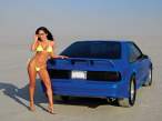 mmfp_0809_05_z+1989_ford_mustang_gt+with_destiny_monique_rear_view.jpg