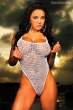 Faren-Williams-posing-in-a-see-through-white-fishnet-swimsuit-for-BlackMen-SSX.jpg