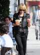 MenaSuvari2011_10_20_picksupanicedcoffeefromUrthCafe1.jpg