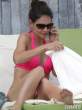 katie-holmes-poolside-in-a-neon-pink-bikini-in-miami-06-435x580.jpg