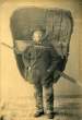 Welsh fisherman carrying a coracle.jpeg