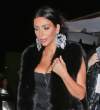 Kim Kardashian Flaunts cleavage as she cosies up to Sam Smith at his concert January 29-2015 045.jpg