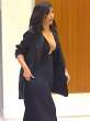 Kim-Kardashian-Deep-Shiny-Cleavage-In-Black-Heading-To-See-Kanye-At-SNL-40th-Anniversary-01-675x900.jpg