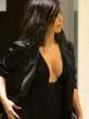 Kim-Kardashian-Deep-Shiny-Cleavage-In-Black-Heading-To-See-Kanye-At-SNL-40th-Anniversary-02-675x900.jpg