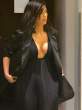 Kim-Kardashian-Deep-Shiny-Cleavage-In-Black-Heading-To-See-Kanye-At-SNL-40th-Anniversary-03-675x900.jpg